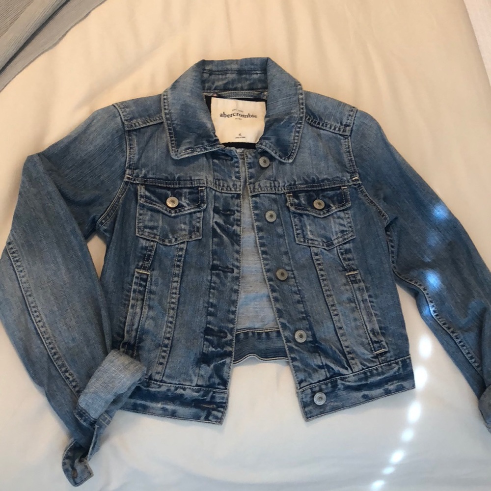 Distressed denim jacket